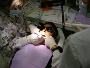 A child gets a sealant application as part of his school-based dental sealant program funded by the Delta Dental of Arizona Foundation.