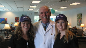 Event Organizers Kristie Parton, Community Service Chair for the American Student Dental Association and Christine Van Grossbeck, both third-year dental students, along with Dr. Russell O. Gilpatrick, Professor and Dean of the College of Dental Medicine at Midwestern University on Super Sealant Saturday 2013.