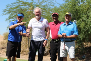 Dr. Brien Harvey and his foursome pose for a picture during the tournament.